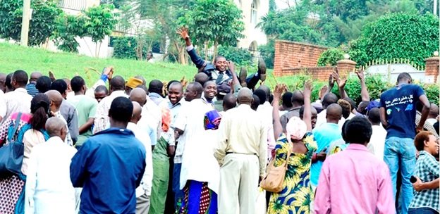 Residents of Byimana Village in Gasabo district toss up their newly elected leader 