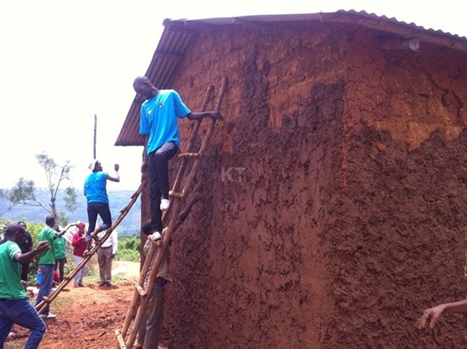 Genocide Survivors Build Houses For Needy Survivors 