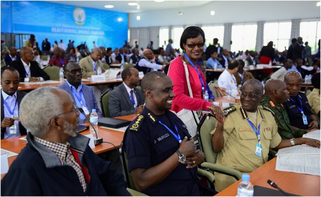 Participants discussing inside the meeting hall on first day of the 13th National Leadership Retreat in Gabiro