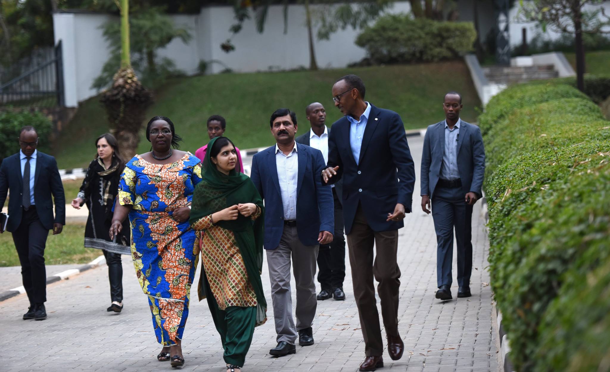 President Paul Kagame chats with Nobel laureate Malala Yousafzai after arriving in Rwanda