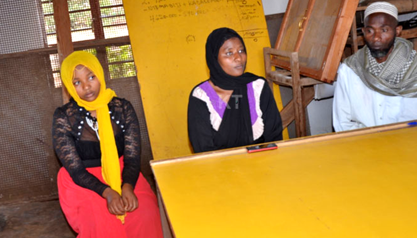 The teenage girl (in red ) with her Parents 