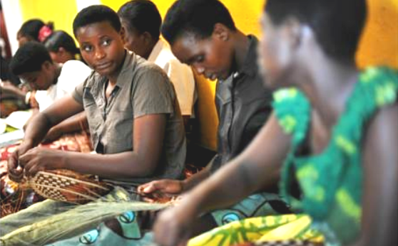 Rwandan women weaving baskets 