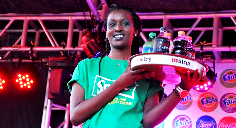 Displaying some of the new soft drinks Bralirwa packages in plastic bottles