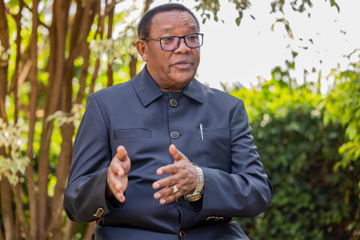 A Suit, a Borrowed Car, and a Country to Save: The Story of Dr. Pierre ...